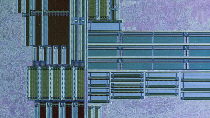 Microchip integrated circuit architecture under microscope