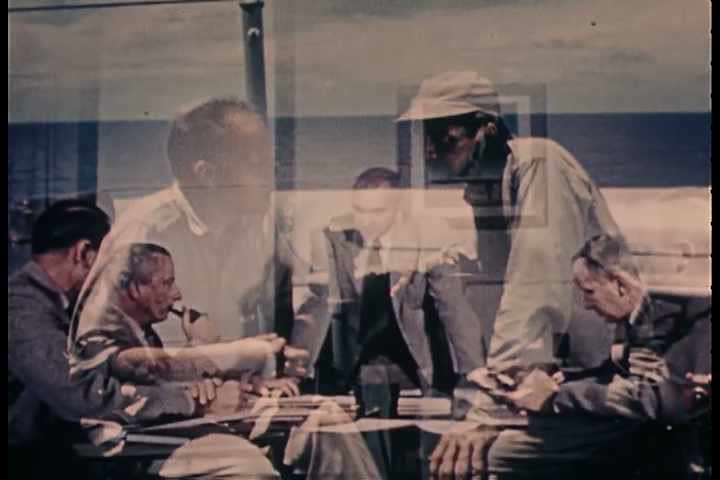 1950s - At Los Alamos Lab in New Mexico, men prepare to test nuclear weapons.