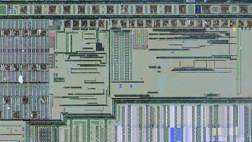 Microchip integrated circuit architecture under microscope