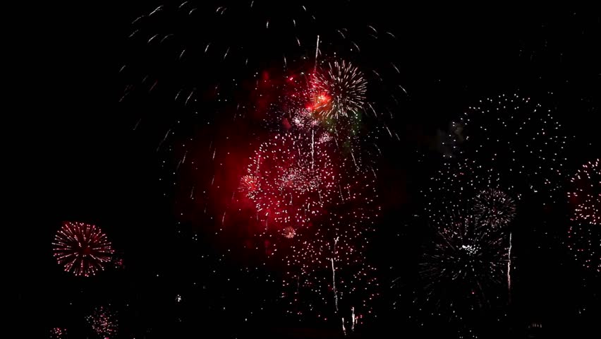 Colorful Fireworks Exploding In Night Sky