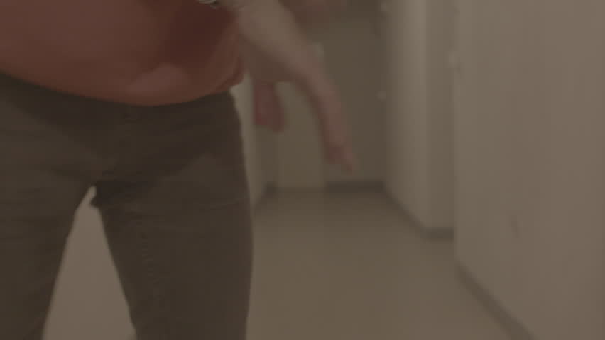 Candidate practices with jitters, Nervous individual rehearses gestures and readies clothing carefully, Candidate with anxiety practices gestures and finetunes clothing in silent preparation