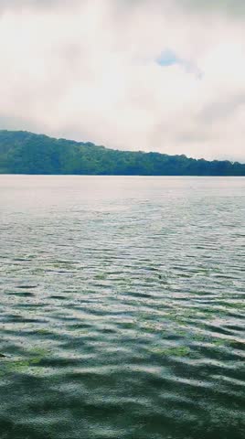 a view of a lake when it rains heavily 