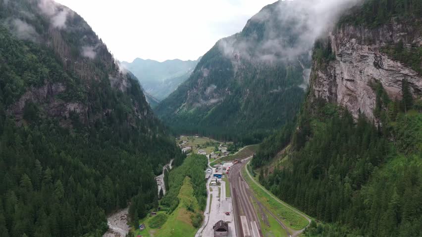 Aerial View of Mountain Valley With Railway Station
