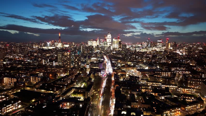 London City Skyline at Night During Rush Hour