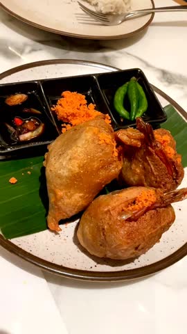 Fried beancurd stuffed with sauteed prawn and vegetable