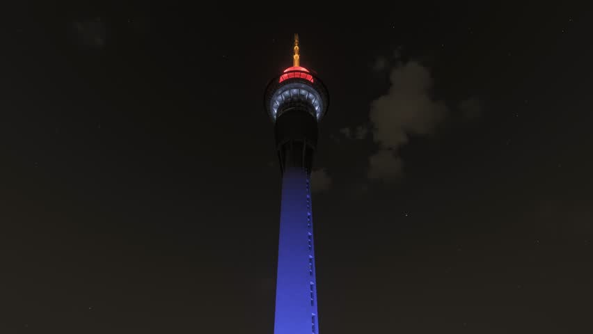 3D - Night drone aerial view of Sky Tower in Auckland in North Island. New Zealand