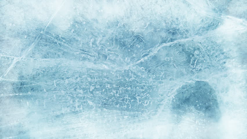 Super Slow Motion Shot of Freezing Ice Texture and Gently Flowing Cold Smoke at 1000fps.