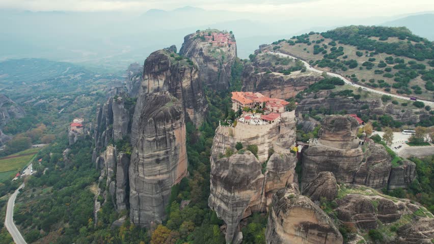 Scenic Drone Footage of Meteora Greece. Massive Rocks, Nature and Historic Monasteries.