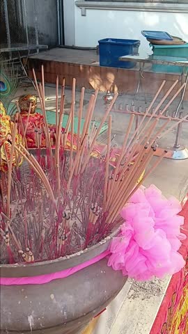 Burning Incense Sticks at Shrine