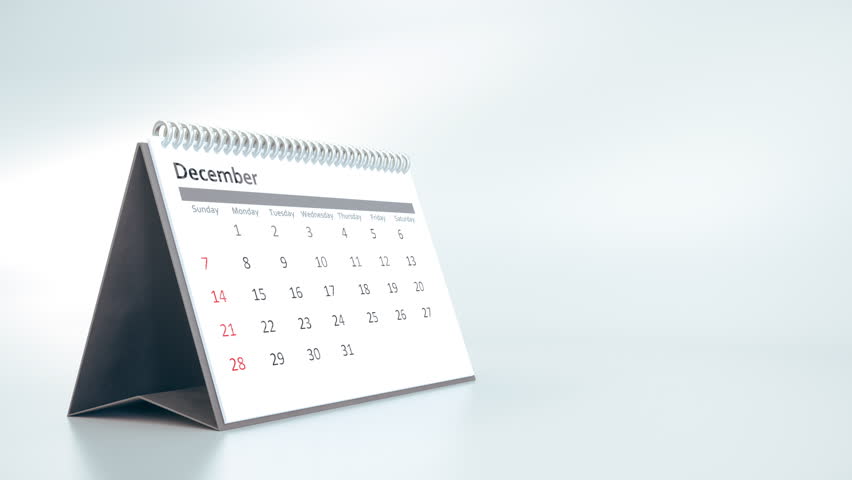 Desktop calendar animation with pages turning rapidly, showing the passing of a full year. Concept of time, deadlines, and schedules on a clean white background.