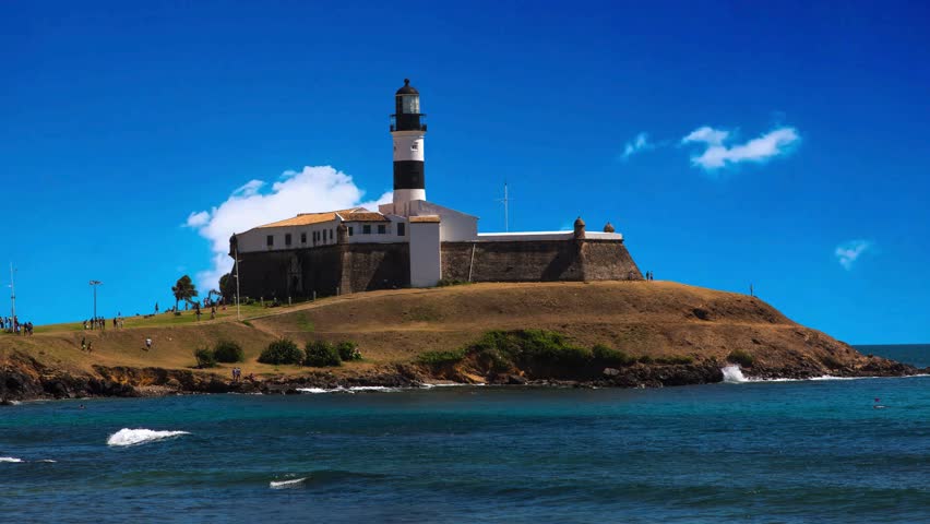 Sunset at the famous Farol da Barra in the city of Salvador, BahiaSunset at the famous Farol da Barra in the city of Salvador, BahiaCoastal cityscape aerial view. Aerial landscape of coast city. Great
