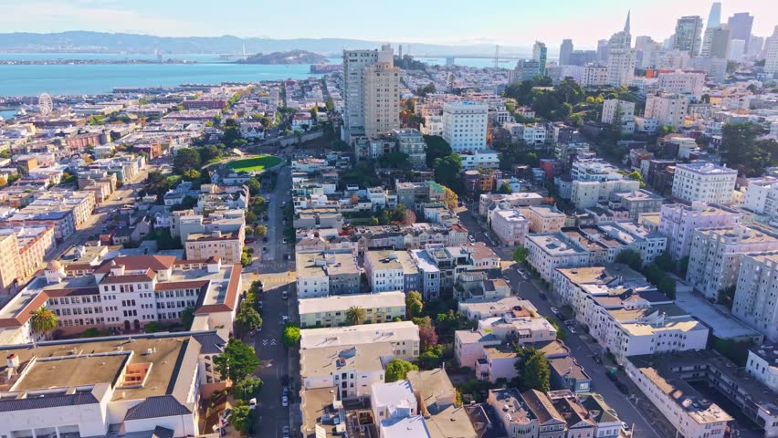 This stunning aerial captures the iconic hills and skyline of San Francisco bathed in the light of the morning sun