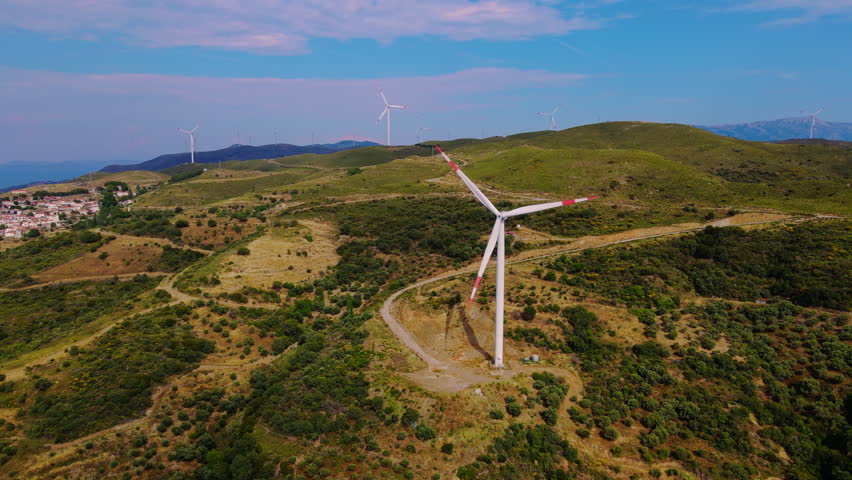 Renewable wind power farm energy transition, Aerial drone view of electricity generator wind turbines with carbon neutral