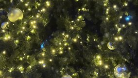 Christmas Tree Lights Twinkling With Silver Baubles And Falling Snowflakes. Perfect For Holiday Greeting Videos, Festive Wallpapers, Winter-Themed Promos And New Year Visual Content - Powered by Shutterstock - Get 15% off with code: PIKWIZARD15