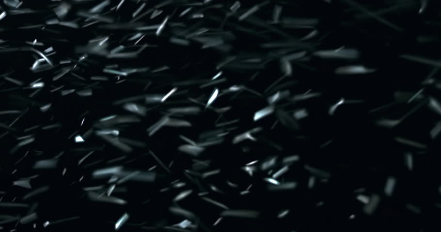 High-speed snowflakes sweep across a dark void in this cinematic Christmas VFX element, creating an intense blizzard texture ideal for festive trailers, winter scenes, and atmospheric overlays. 