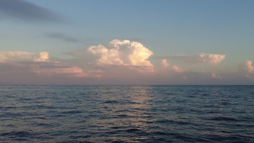 Beautiful sky before sunset, seen from a moving boat on the bay near Madeira Beach, Florida, U.S.A
