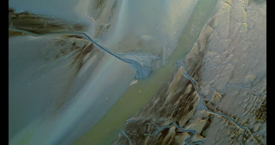 Aerial view of the tidal mudflats and channels of the Eemsdelta, Groningen, The Netherlands