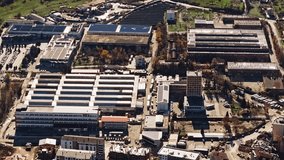 Aerial drone view of a modern data center building exterior. High-tech server space, industrial data processing, big data infrastructure and large-scale computing center operated by big tech companies - Powered by Shutterstock - Get 15% off with code: PIKWIZARD15