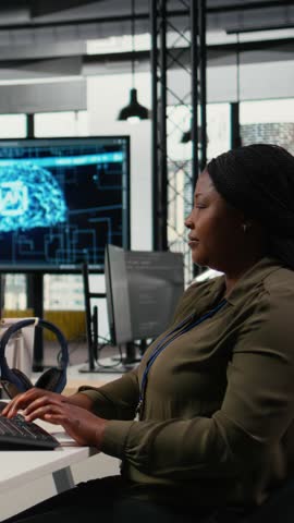 Vertical video Startup team celebrating in office after seeing live market updates showing stock surging. Tech venture employees excited after securing funding to become publicly traded company