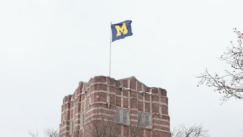 Ann Arbor, MI - November 30 2025:  University of Michigan flag over the student union