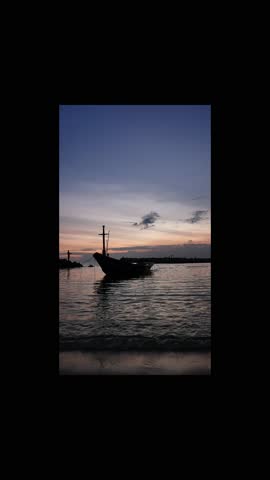 Sunset over the sea at dusk