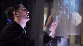 Business Team working in office, analyzing reports and entering data. Team members collaborating on artificial intelligence project talk about enterprise AI, deep learning, big data, neural networks. - Powered by Shutterstock - Get 15% off with code: PIKWIZARD15