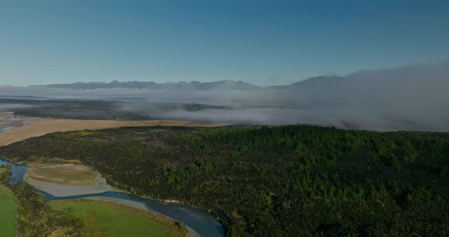 Aerial view of Eglinton Valley, serene river in lush New Zealand landscape