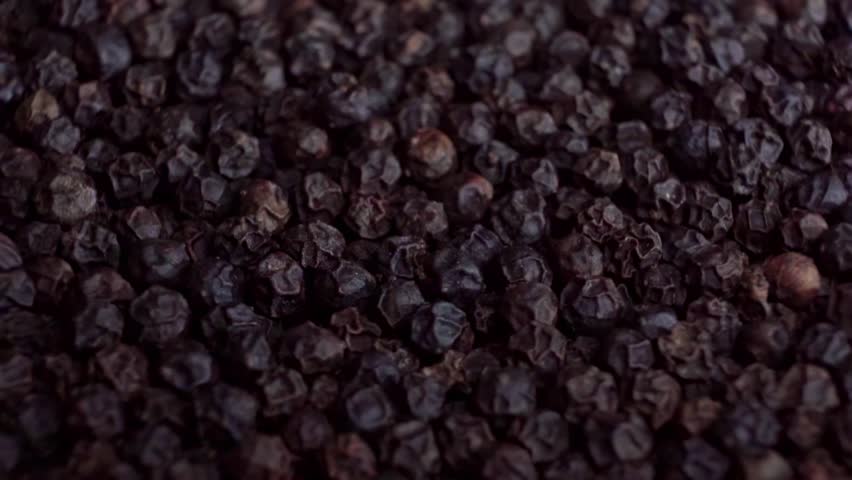 Falling Black Peppercorns Spice Seasoning