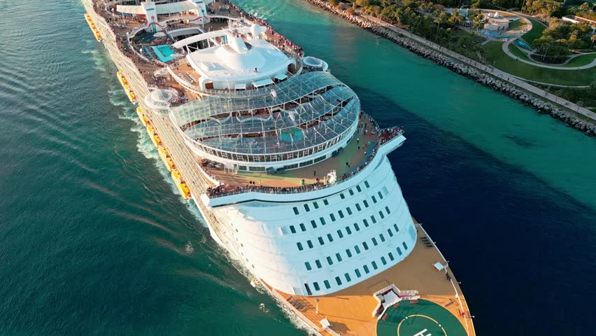 Aerial luxury liner voyage. Ship top view. Luxury liner resort. Cruise ship voyage, 4k. Entertainment deck. Aerial top view of cruise in summer vacation. Cruise ship tour and travel at sea