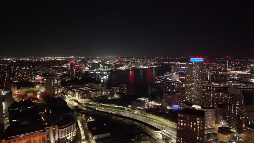 Night view East London busy road near Canary Wharf aerial