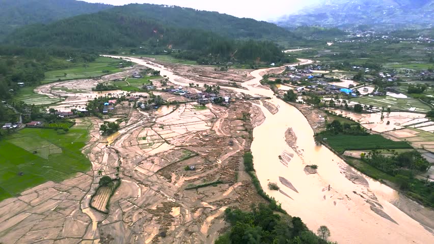 Aerial View of Widespread Flood Damage Across Farmlands and Villages in Gayo Lues, Aceh
