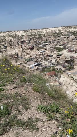 Panorama view of fairy chimneys and the red valley on a beautiful sunset in Goreme, Cappadocia 
