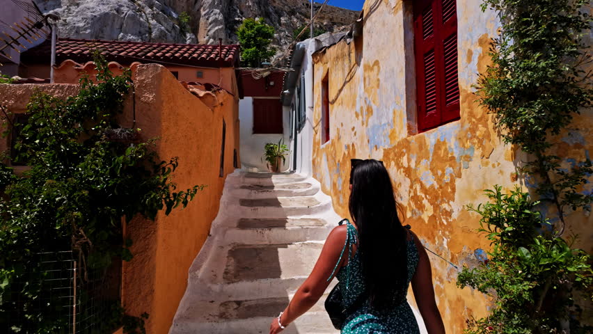 Tourists visiting an ancient village with mythological influences on the Island of Crete, Greece