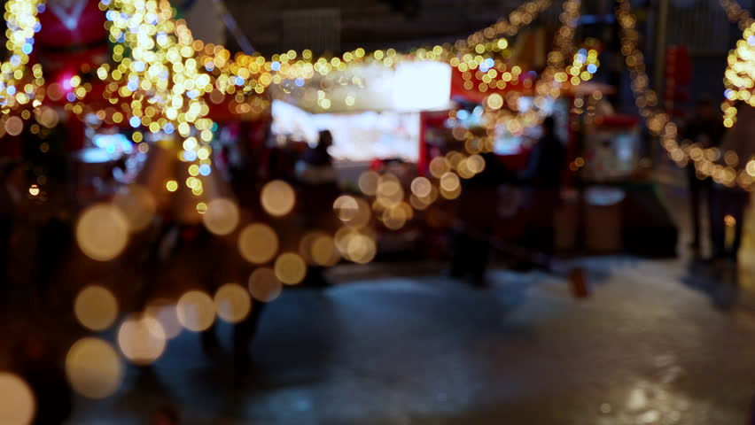 Festive Christmas Market with Warm Bokeh Lights and Holiday Atmosphere