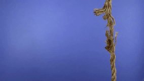 Close-up of hands struggling to climb a frayed rope and ultimately letting go. Intense, dramatic footage capturing effort, struggle, and human defeat. - Powered by Shutterstock - Get 15% off with code: PIKWIZARD15