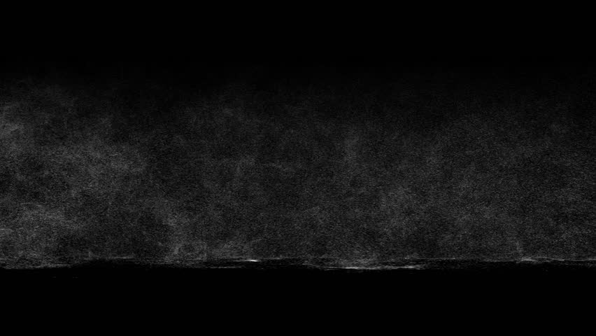 White dust or snow blows horizontally across ground on black background. Ideal for blizzard, sandstorm, or windy weather overlays