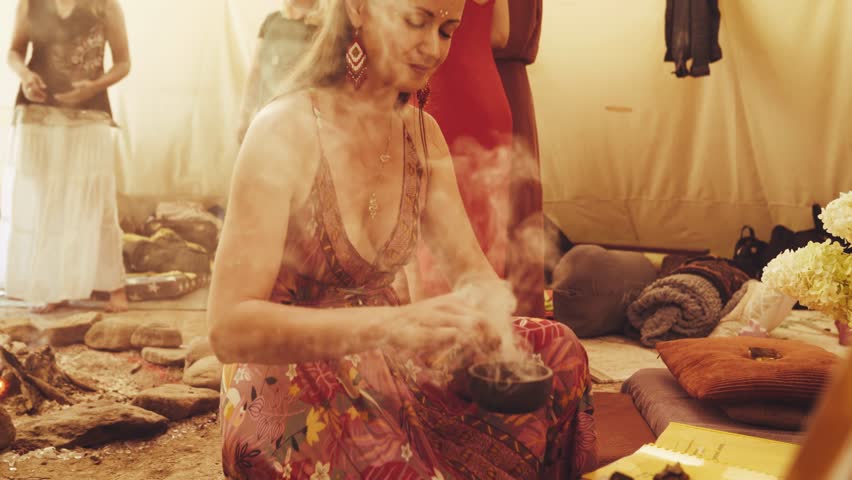 Spiritual healing ceremony, Mystical gathering with aromatic incense, Cleansing ritual held in tipi.