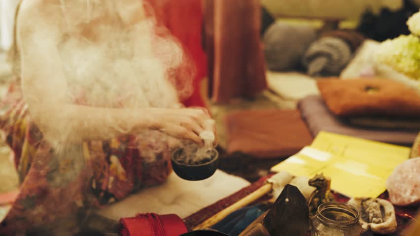 Spiritual healing ceremony, Mystical gathering with aromatic incense, Cleansing ritual held in tipi.