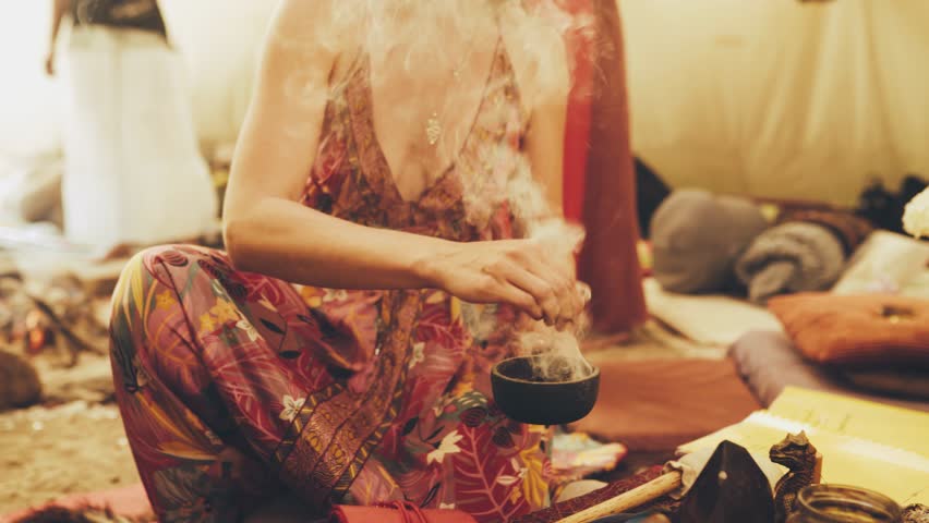 Spiritual healing ceremony, Mystical gathering with aromatic incense, Cleansing ritual held in tipi.