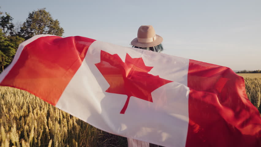 Canadian Patriot Woman Running With National Flag On Field. Red Maple, Patriotic Spirit, Symbol of Canada freedom, independence, national pride.