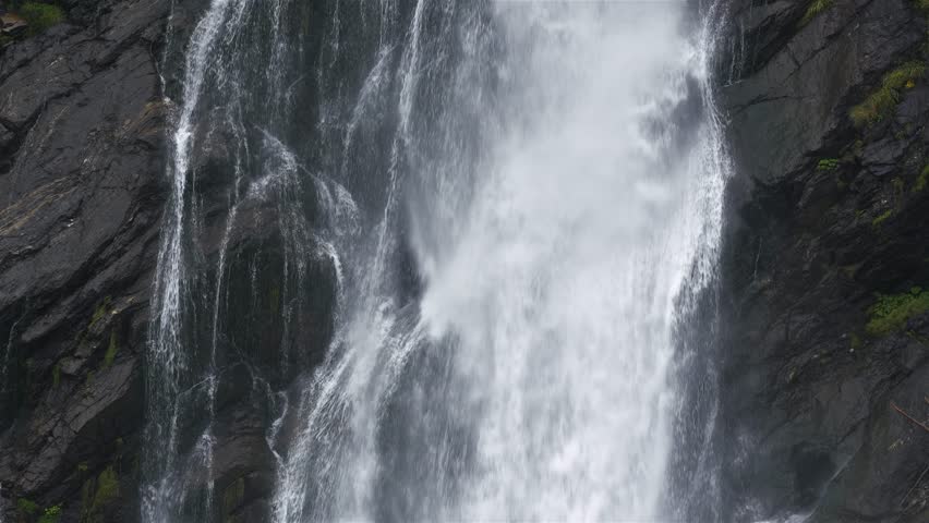 Water Falling Over Dark Rocks, Peaceful Waterfall