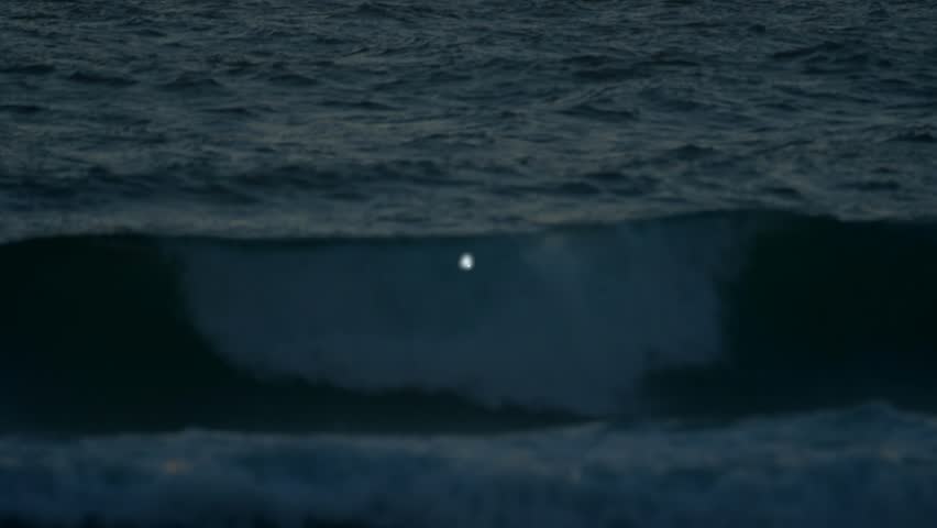 HUD target appearing on sea briefcase emerging linking icons expanding colleague network toward sun. Ocean, sunset, silhouettes, professionals, collaboration, teamwork, connectivity