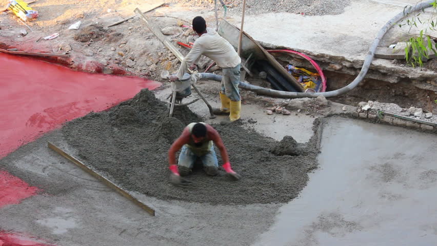 AVSALLAR, TURKEY - MAY 08, 2013: Workers at construction site makes floor of