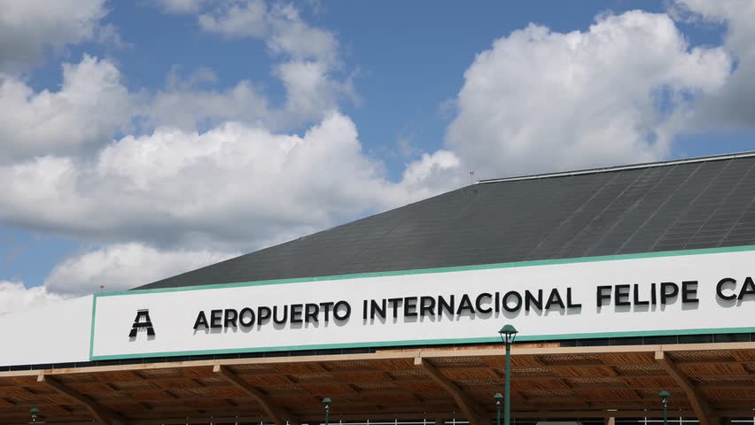 sign above tulum airport in yucatan peninsula mexico (quintana roo state) new air travel hub airplane getaway beach holiday tourism riviera maya