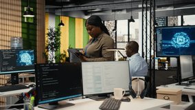 Software developers working in AI startup training predictive models for language processing tasks. Deep learning tech specialists use technical expertise for complex IT requirements, camera A - Powered by Shutterstock - Get 15% off with code: PIKWIZARD15