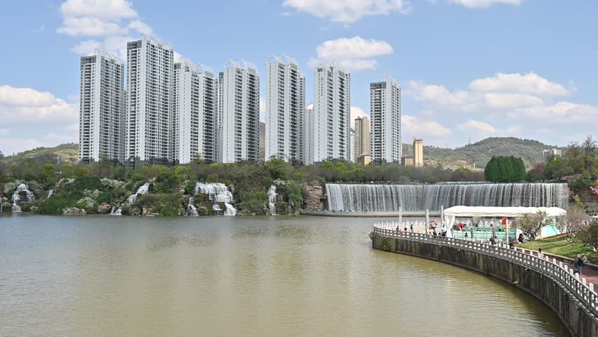 Beautiful view of Kunming waterfall park in China. The waterfall is claimed to be the largest man-made one in Asia which is 12.5 meters in height and 400 meters in width.