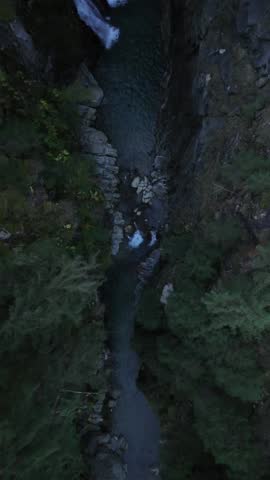 Roffla Waterfall gorge in Switzerland Rofflafall water cascade, aerial drone view