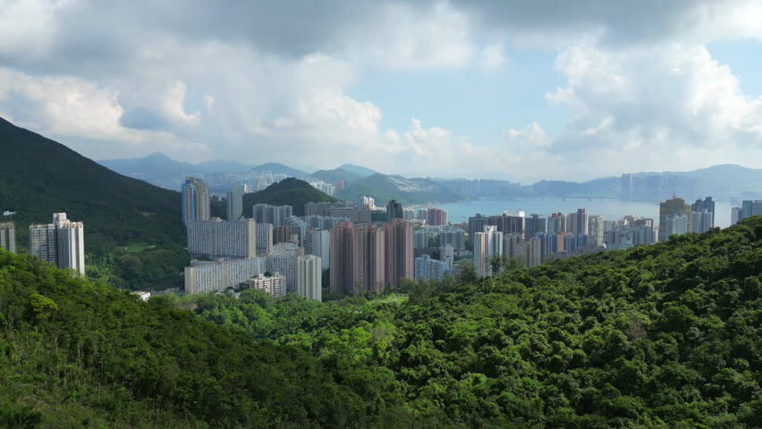 Chai Wan District Hong Kong China Drone Tracks Forward From Shek O Country Park 4K 60FPS
