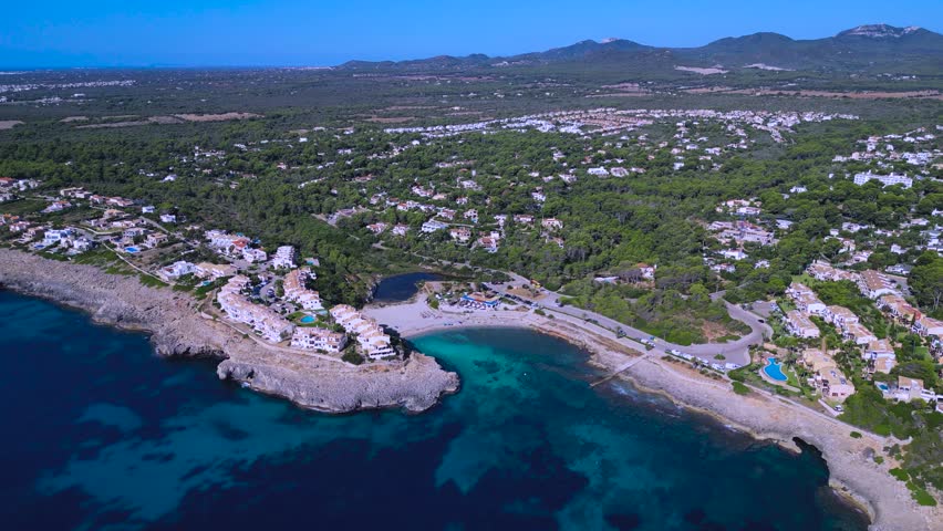 Stunning drone footage of luxury real estate developments near Cala Murada in Mallorca, Balearic Islands.