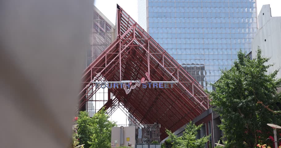 Wide shot of the iconic 4th Street Live! sign in downtown Louisville, Kentucky. A well-known entrance to the city’s entertainment district.